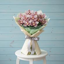 Букет цветов из:  Орхидеи и Розы в Волгограде